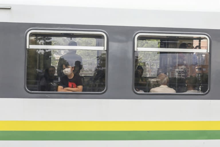 In a study from mid-February of 44,000 confirmed cases in and around the city of Wuhan, where the pandemic began, the 10-to-19 age bracket made up only one percent of infections (AFP Photo/JOAQUIN SARMIENTO)