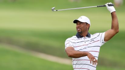 Yahoo Sports - Tiger Woods got off to a rough start with two early triple bogeys on Friday at