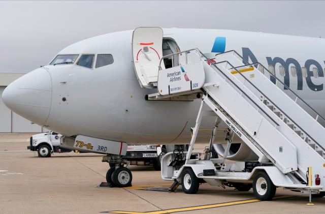 An exterior view of an American Airlines B737 MAX airplane is seen at Dallas-Forth Worth International Airport in Dallas, Texas on December 2, 2020. - The Boeing 737 MAX will take another key step in its comeback to commercial travel on December 2, 2020 by attempting to reassure the public with a test flight by American Airlines conducted for the news media. After being grounded for 20 months following two deadly crashes, US air safety officials in mid-November cleared the MAX to return to service following changes to the plane and pilot training protocols. (Photo by Cooper NEILL / AFP) (Photo by COOPER NEILL/AFP via Getty Images)