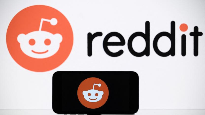 A picture taken on October 5, 2021 in Toulouse shows the logo of Reddit social media displayed by a by a tablet and a smartphone. (Photo by Lionel BONAVENTURE / AFP) (Photo by LIONEL BONAVENTURE/AFP via Getty Images)