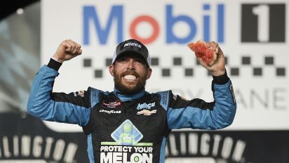 Getty Images - DARLINGTON, SOUTH CAROLINA - MAY 10: Ross Chastain, driver of the #45 Buckle Up South Carolina Chevrolet, celebrates in victory lane after winning the NASCAR Craftsman Truck Series Buckle Up South Carolina 200 at Darlington Raceway on May 10, 2024 in Darlington, South Carolina. (Photo by James Gilbert/Getty Images)