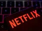 Netflix slips after stopping subscriber tally report, downbeat Q2 revenue forecast