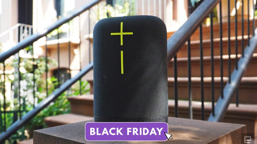 The Ultimate Ears Epicboom portable speaker sits on a stoop out front of a building. The Black Friday overlay is on the image.