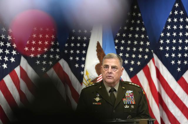 FILE - Chairman of the Joint Chiefs of Staff U.S. General Mark Milley addresses the media during a meeting of NATO defense ministers at NATO headquarters in Brussels, on June 15, 2023. The top U.S. military official on Friday, July 14, encouraged Japan's recent commitment to doubling its defense spending over the next five years, calling Tokyo's new, controversial push for a stronger military a crucial part of efforts to confront rising threats from North Korea and China. (AP Photo/Virginia Mayo, File)