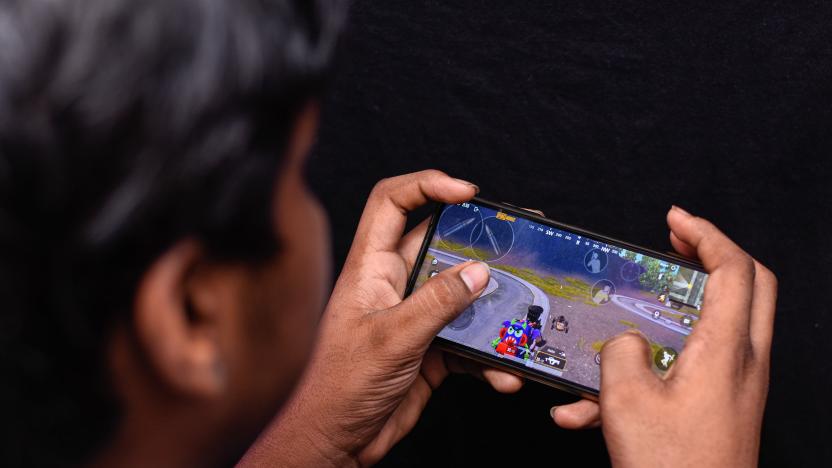 NEW DELHI, INDIA - 2020/07/29: In this photo illustration, a boy playing PUBG (PlayerUnknown's Battlegrounds) on his smartphone.
Indian government is considering a ban on the battle royale format games over data security concerns. (Photo Illustration by Ajay Kumar/SOPA Images/LightRocket via Getty Images)