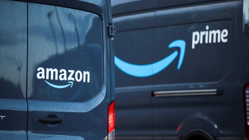 Logos of Amazon and Amazon Prime are pictured on vehicles as Extinction Rebellion activists protest outside the Amazon Fulfilment Centre in Altrincham, near Manchester, Britain, November 26, 2021. REUTERS/Carl Recine