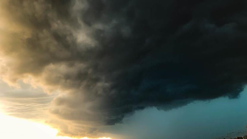 Supercell storm during summer in the Barcelona coastline moving forward like a wave with heavy rain and thunderstorm.