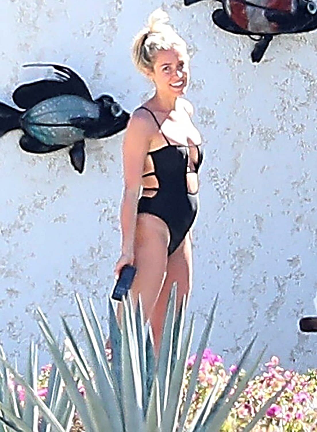 Kristin Cavallari relaxed in a black swimsuit during a getaway in Cabo San Lucas