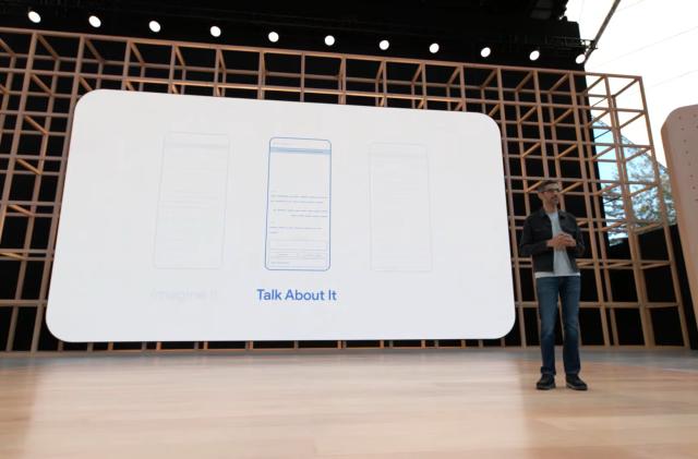 Google CEO Sundar Pichai on stage at Google IO 2022 in front of a screen showing the AI Test Kitchen app.