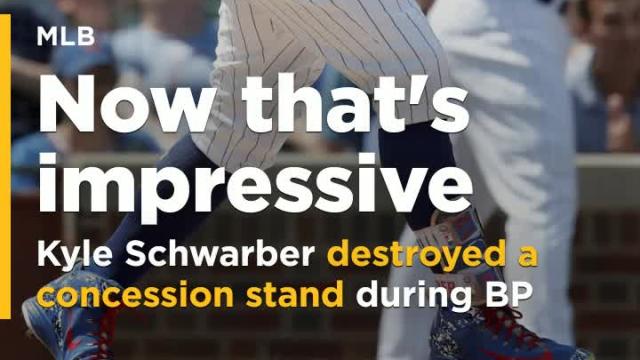 Cubs OF Kyle Schwarber showcases power by destroying a concession stand during batting practice
