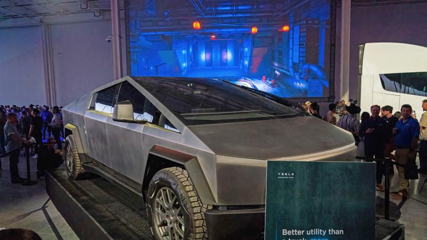 The Tesla Cybertruck is on display at the Tesla Giga Texas manufacturing facility during the "Cyber Rodeo" grand opening party on April 7, 2022 in Austin, Texas. - Tesla welcomed throngs of  electric car lovers to Texas on April 7 for a huge party inaugurating a "gigafactory" the size of 100 professional soccer fields. 