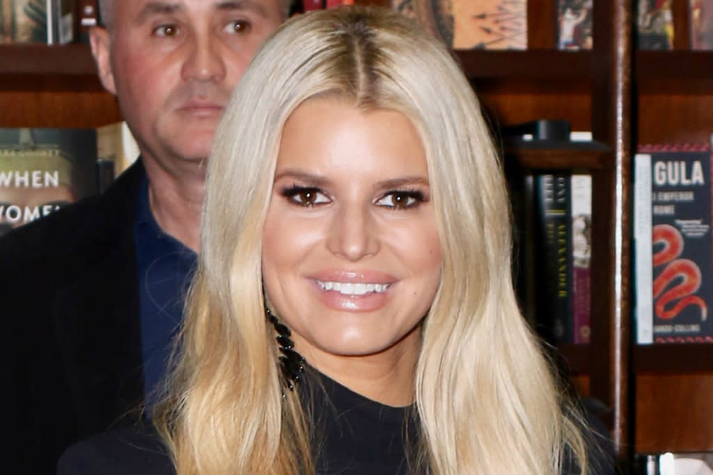 Jessica Simpson Brings Back Her Daisy Dukes With A Boho Sweater