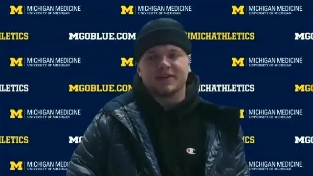 Michigan football's Aidan Hutchinson on going from teammates to rivals with MSU's Theo Day