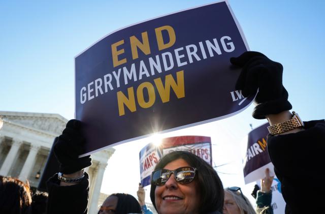 Demonstrators protest during a Fair Maps rally outside the U.S. Supreme Court, in Washington, U.S., March 26, 2019.  REUTERS/Brendan McDermid