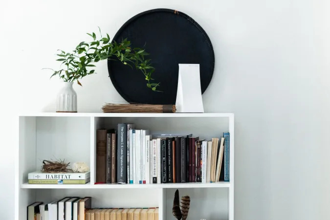 Press image of the Gryphon Tower, photographed on a bookshelf.