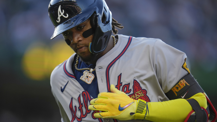 Associated Press - Atlanta Braves' Ronald Acuña Jr. jogs to the dugout after grounding out during the first inning of the team's baseball game against the Chicago Cubs, Wednesday, May 22, 2024, in Chicago. (AP Photo/Erin Hooley)