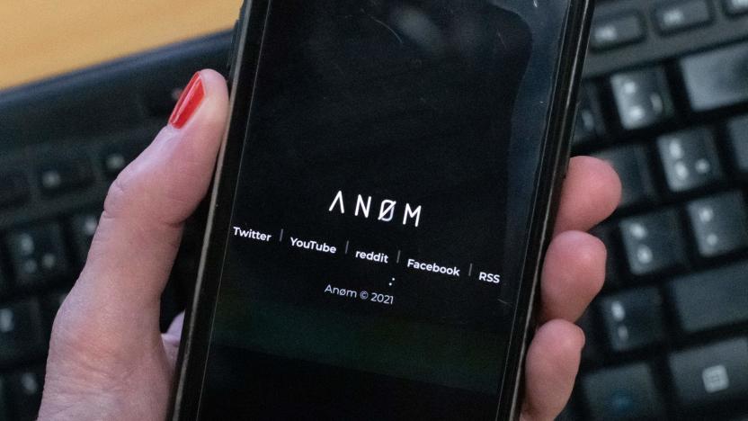 An illustration picture shows the ANoM logo displayed on the screen of an smartphone on june 8, 2021 in Paris. - Some 250 people were arrested in Sweden and Finland in the global sting on organised crime, authorities said on June 8, 2021, using phones planted by the US FBI, law enforcement officers were able to read the messages of global underworld figures in around 100 countries as they plotted drug deals, arms transfers and gangland hits on the compromised ANOM devices. (Photo by Olivier MORIN / AFP) (Photo by OLIVIER MORIN/AFP via Getty Images)