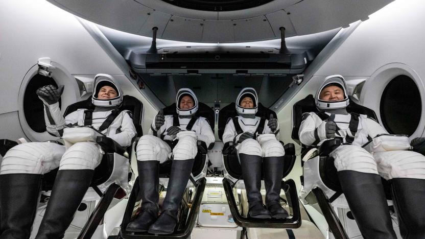 Roscosmos cosmonaut Anna Kikina, left, NASA astronauts Josh Cassada and Nicole Mann, and Japan Aerospace Exploration Agency (JAXA) astronaut Koichi Wakata, right, are seen inside the SpaceX Dragon Endurance spacecraft onboard the SpaceX recovery ship Shannon shortly after having landed in the Gulf of Mexico off the coast of Tampa, Florida, Saturday, March 11, 2023. 