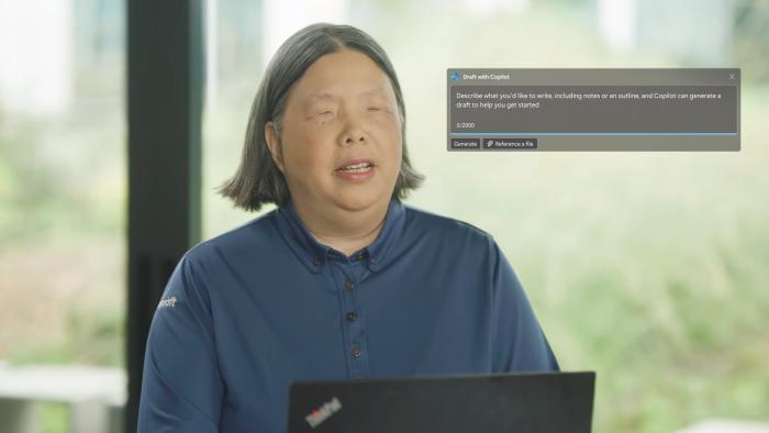 A screenshot from a Microsoft video about its Copilot AI feature's accessibility support. The screenshot shows a person with a vision-related disability and an overlaid screenshot of a "Draft with Copilot" tool.