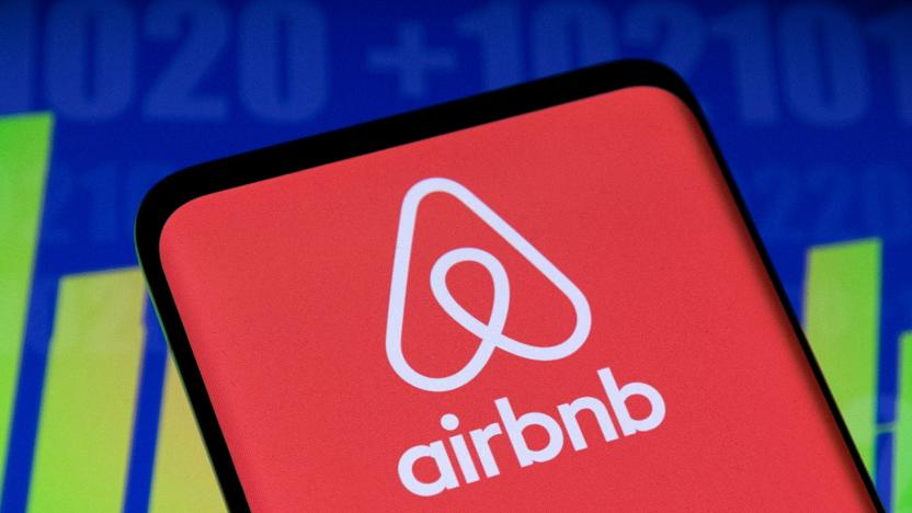 Airbnb logo and stock graph are seen displayed in this illustration taken, May 3, 2022. REUTERS/Dado Ruvic/Illustration