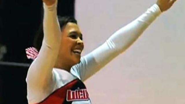 Raw: Cheerleader Makes Flip, Half-Court Shot 