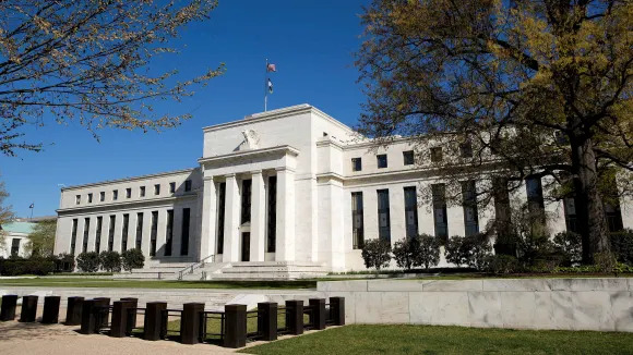 Fed leaves rates unchanged, says inflation still too high to cut