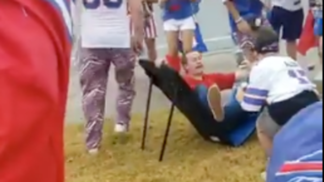 Buffalo Bills Fans Smash Table at Tailgate Party