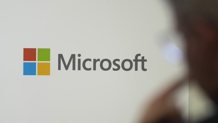 FILE - A logo of Microsoft is displayed during an event at the Chatham House think tank in London, Monday, Jan. 15, 2024. On Friday, Feb. 9, The Associated Press reported on stories circulating online incorrectly claiming Microsoft plans to “disable computers of users who share ‘non-mainstream content’ online.” (AP Photo/Kin Cheung, File)