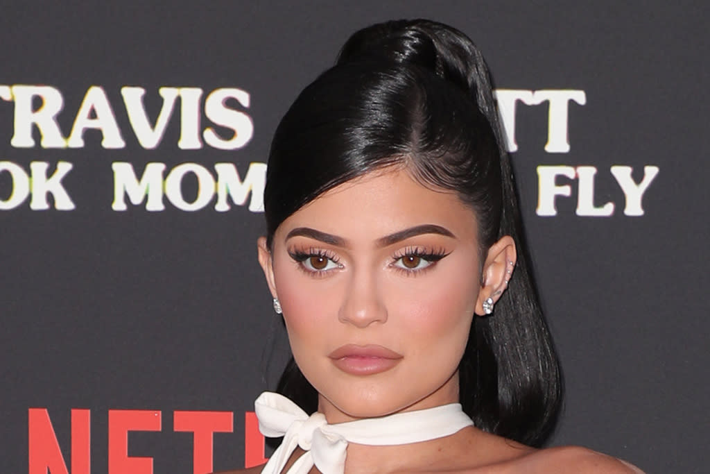 Kylie Jenner Goes Full-On Designer in a Versace Robe & Louis Vuitton Slippers
