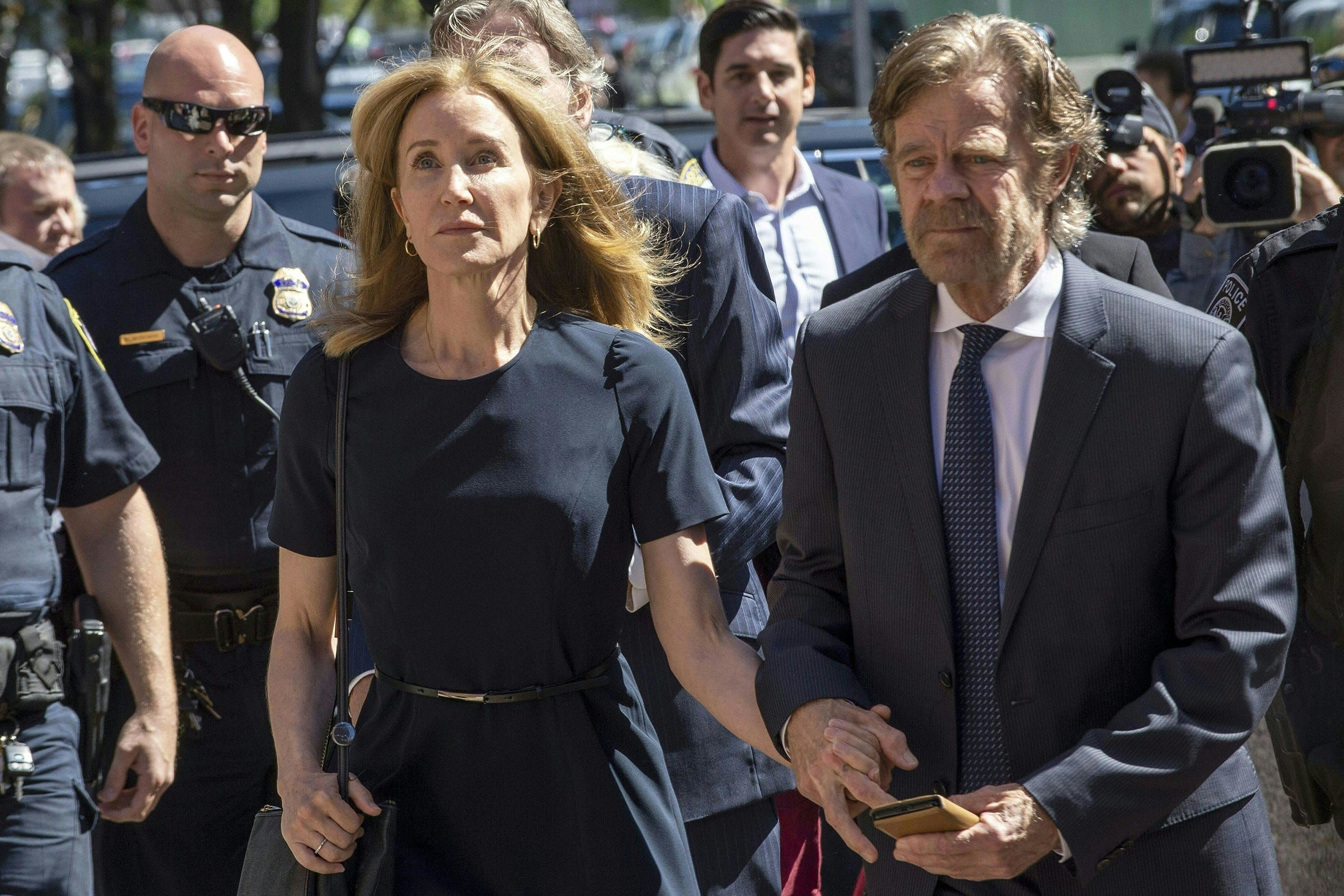 Felicity Huffman sentenced to 14 days in jail in college admissions scandal