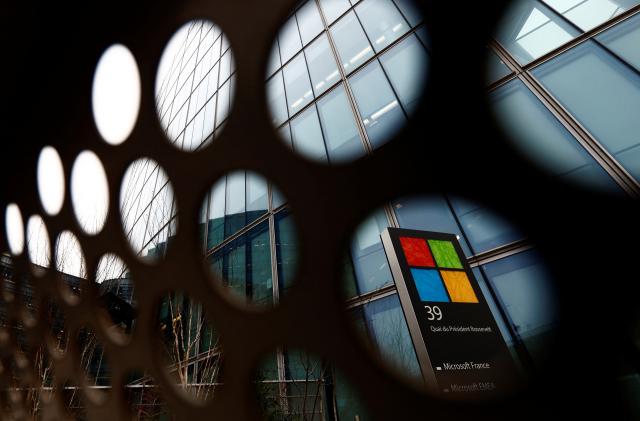 A view shows a Microsoft logo at Microsoft offices in Issy-les-Moulineaux near Paris, France, January 25, 2023. REUTERS/Gonzalo Fuentes