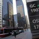 TSX edges closer to record high on resource shares