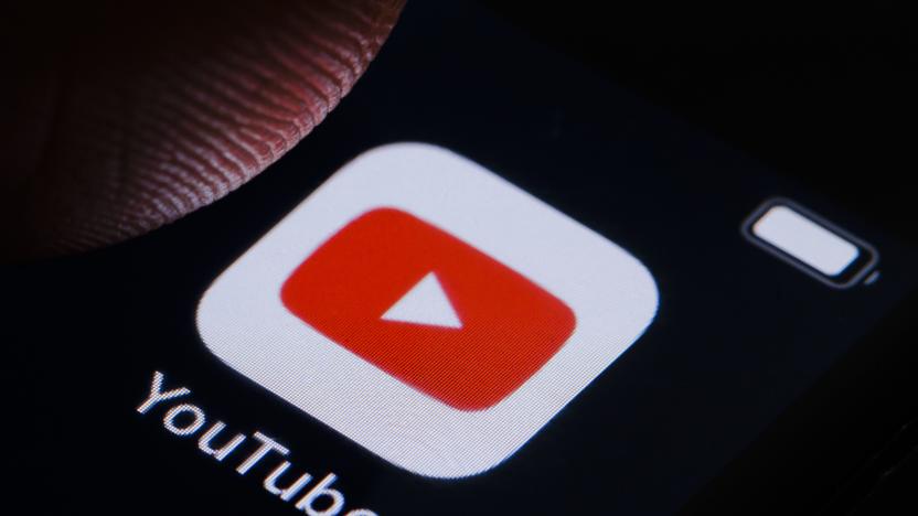 BERLIN, GERMANY - MARCH 10: In this photo illustration the logo of YouTube can be seen on a smartphone on March 10, 2022 in Berlin, Germany. (Photo Illustration by Thomas Trutschel/Photothek via Getty Images)