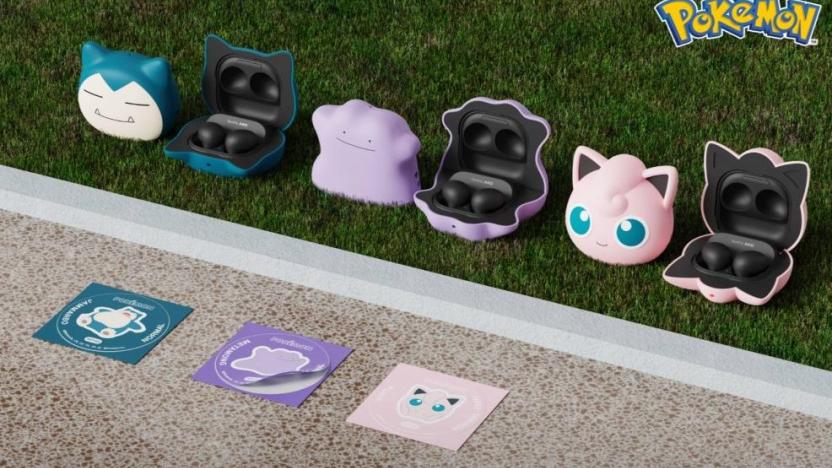 Six earbud cases of Pokemon sit on grass. 