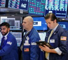 Wall Street stumbles as bond yields rise, health stocks fall