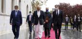 Secretary of State Antony Blinken, center right, walks with Afghanistan's Foreign Minister Mohammad Haneef Atmar, center left, at the presidential palace in Kabul. (AP)