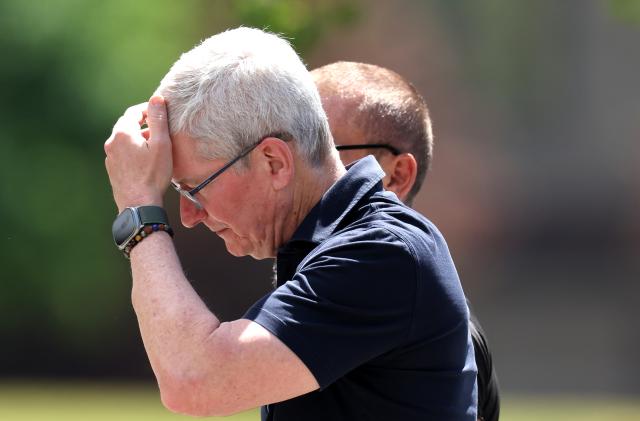 SUN VALLEY, IDAHO - JULY 13: Tim Cook, Apple CEO, walks from lunch during the Allen & Company Sun Valley Conference on July 13, 2023 in Sun Valley, Idaho. Every July, some of the world's most wealthy and powerful figures from the media, finance, technology and political spheres converge at the Sun Valley Resort for the exclusive weeklong conference. (Photo by Kevin Dietsch/Getty Images)