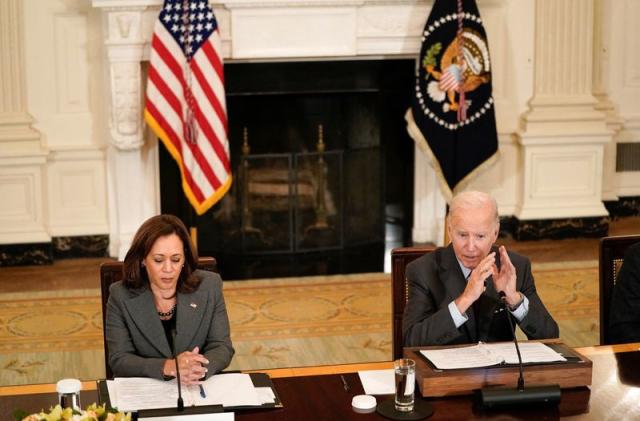 FILE PHOTO - U.S. President Biden and Vice President Harris attend a meeting at the White House