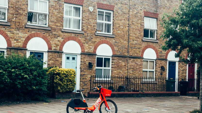 London/UK - 17/07/2019: Dockless Jump electric bike locked and left on a sidewalk of a street in Camden. Jump is an electric bicycle sharing system operating in the United Kingdom, owned by Uber