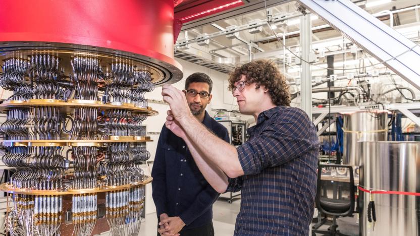 A handout picture from October 2019 shows Sundar Pichai and Daniel Sank (R) with one of Google's Quantum Computers in the Santa Barbara lab, California, U.S. Picture taken in October 2019.      Google/Handout via REUTERS        THIS IMAGE HAS BEEN SUPPLIED BY A THIRD PARTY.