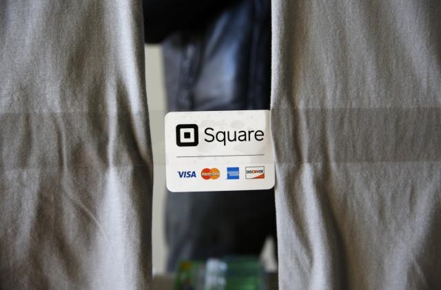 An advertisement for the Square Inc payment processor is seen outside a vendors site along the High Line in New York March 9, 2016. REUTERS/Shannon Stapleton