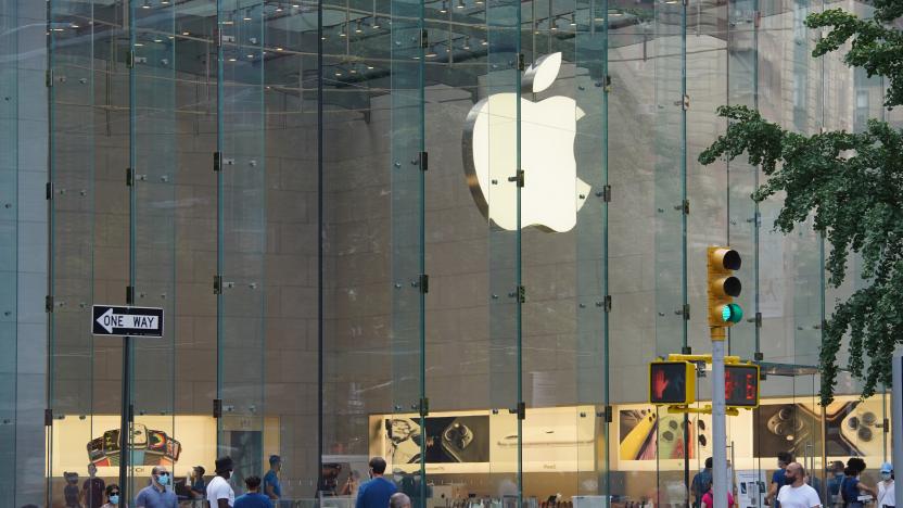 NEW YORK, NEW YORK - JULY 20: Customers wait in line to go into the Apple Store as New York City enters Phase 4 of re-opening following restrictions imposed to curb the coronavirus pandemic on July 20, 2020 in New York, New York. The fourth phase allows outdoor arts and entertainment, sporting events without fans and media production.  (Photo by Rob Kim/Getty Images)