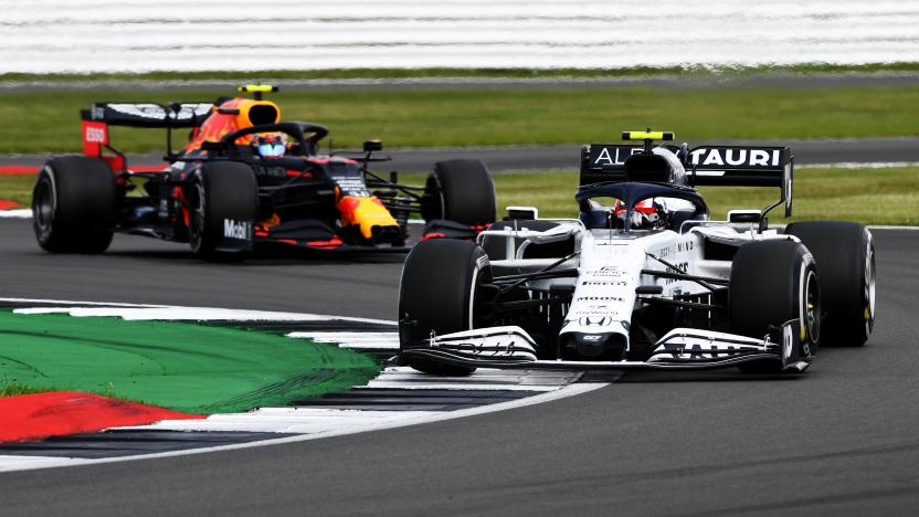NORTHAMPTON, ENGLAND - AUGUST 02: Pierre Gasly of France driving the (10) Scuderia AlphaTauri AT01 Honda leads Alexander Albon of Thailand driving the (23) Aston Martin Red Bull Racing RB16 on track during the F1 Grand Prix of Great Britain at Silverstone on August 02, 2020 in Northampton, England. (Photo by Rudy Carezzevoli/Getty Images)