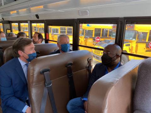 US Senator Raphael Warnock Tours Blue Bird School Bus Plant, Experiences Electric School Bus