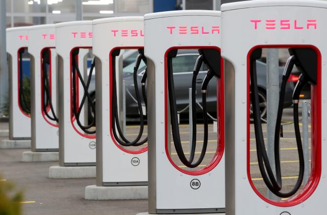 A Tesla Supercharger station is seen in Dietikon, Switzerland October 21, 2020. REUTERS/Arnd Wiegmann