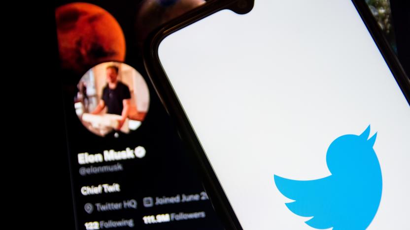 In this photo illustration a Twitter logo seen displayed on a smartphone screen with Elon Musk Twitter in the background in Athens, Greece on October 30, 2022. Elon Musk begins his Twitter ownership with firings. (Photo by Nikolas Kokovlis/NurPhoto via Getty Images)