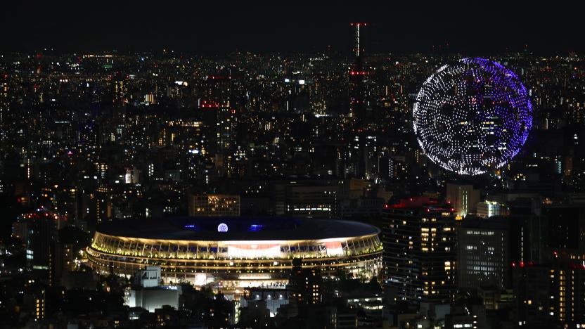 Tokyo 2020 Olympics - The Tokyo 2020 Olympics Opening Ceremony - Olympic Stadium, Tokyo, Japan - July 23, 2021. Drones form a shape of the world during the opening ceremony, seen above the Olympic Stadium REUTERS/Kim Kyung-Hoon