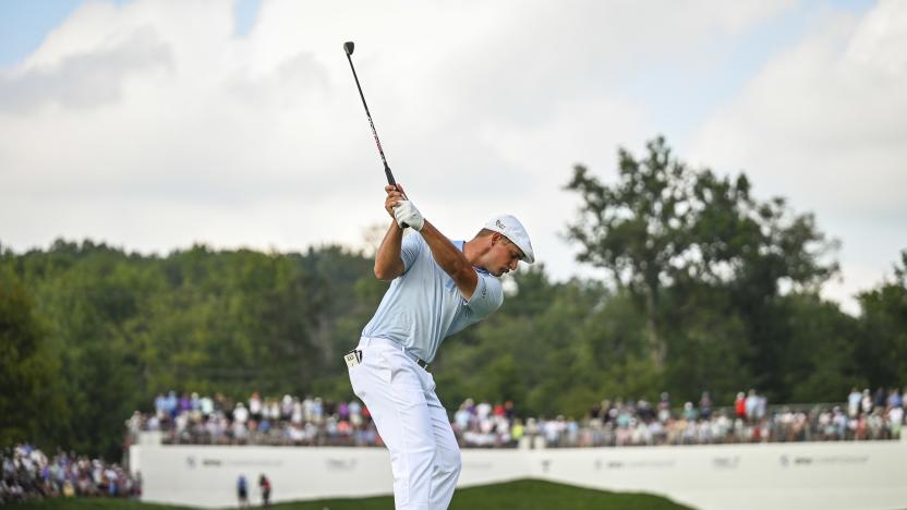 OWINGS MILLS, MD - AUGUST 28:  Bryson DeChambeau at the top of his swing as he plays his shot from the 13th hole drop zone after hitting his tee shot in the water during the third round of the BMW Championship, the second event of the FedExCup Playoffs, at Caves Valley Golf Club on August 28, 2021 in Owings Mills, Maryland. (Photo by Keyur Khamar/PGA TOUR via Getty Images)