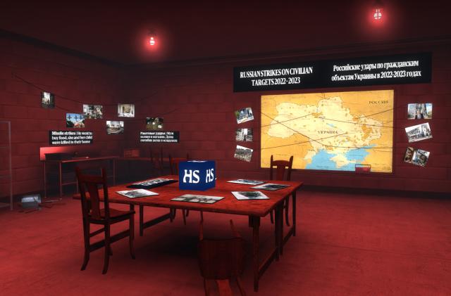 Screenshot of a hidden room in the video game ‘Counter-Strike: Global Offensive.’ Red lights hanging from the ceiling cast a blood-red hue. A table lies in the center with a blue  box showing the logo "HS." The walls contain images and text, including the headline "Russian Strikes on Civilian Targets 2022-2023" over a map.