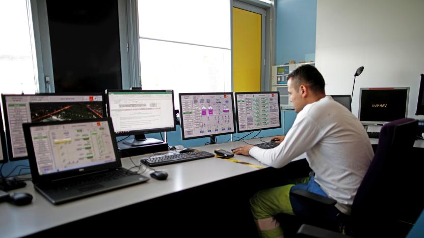 An employee works in the control room of the Marne Aval waste water treatment plant, operated by the Interdepartmental Sanitation Syndicate for the greater Paris metropolitan area (SIAAP), in Noisy-le-Grand, near Paris, France, July 22, 2020. Scientists study the Paris waste water to detect the concentration of COVID-19 traces as France remains vigilant against the spread of the coronavirus disease. Picture taken July 22, 2020. 